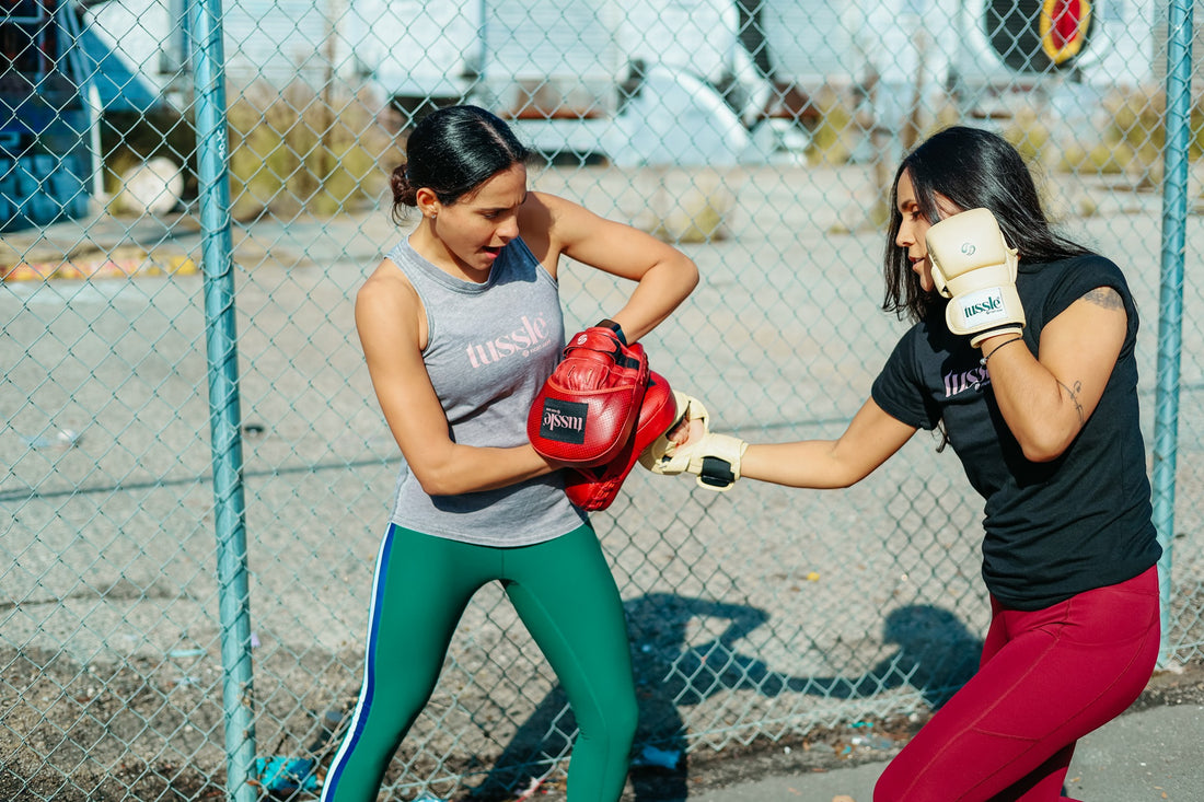 what's better wearing sweatshirt or tee or tank top for female boxers featured image